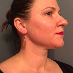 Orange (possibly zircon ) and gold earrings